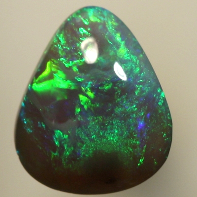 SOLID SEMI BLACK OPAL Sparkles of green and turquoise over a high dome